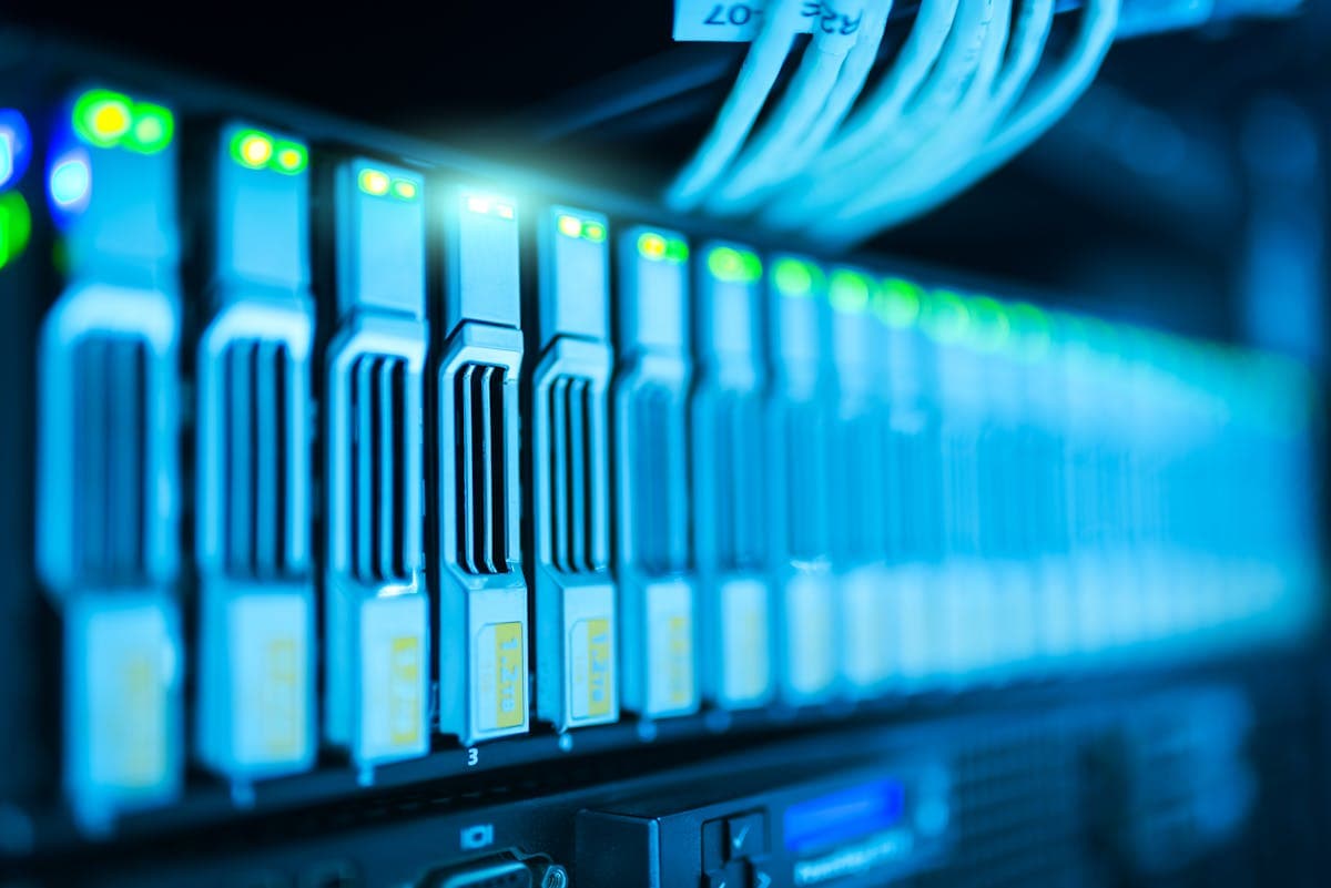 Cloud server racks in a data center running Google Cloud and Firebase services